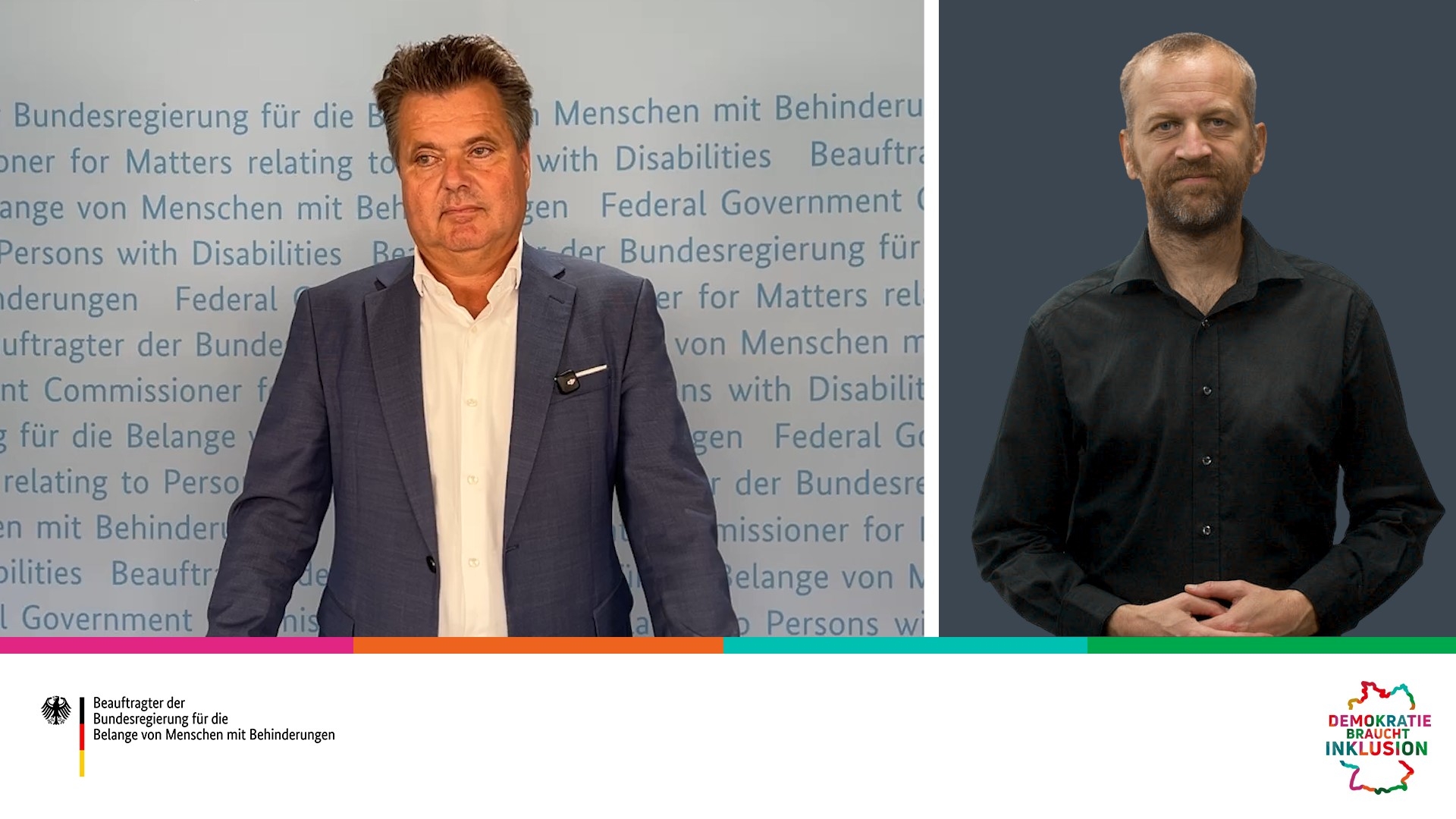 Jürgen Dusel mit Gebärdensprachdolmetschung im Grußwort-Video